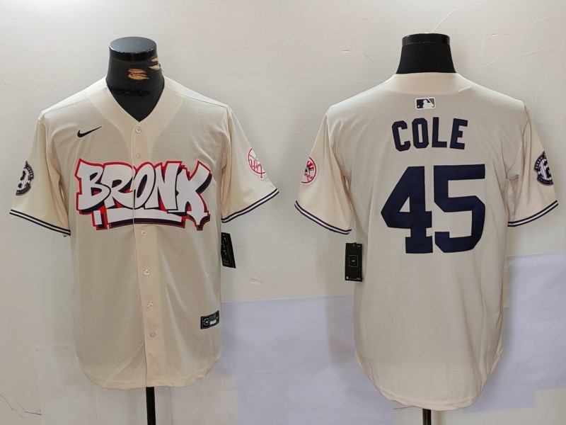 Men's New York Yankees #45 Gerrit Cole Cream The Bronx Graffiti Vapor Limited Stitched Baseball Jersey V2