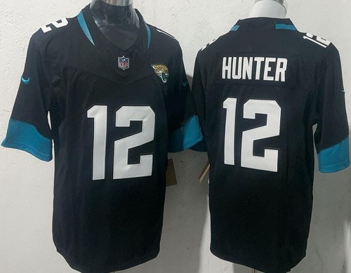 Men's Jacksonville Jaguars #12 Travis Hunter Limited Black FUSE Vapor Jersey
