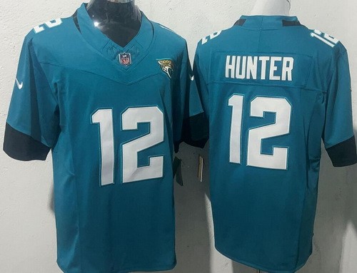 Men's Jacksonville Jaguars #12 Travis Hunter Limited Green FUSE Vapor Jersey